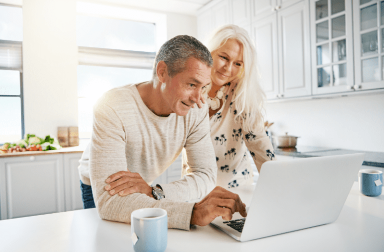 couple reviewing their retirement plan with 500k