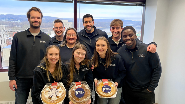 Fuchs Financial team picture at their annual Pie day event featuring Ben Fuchs, Brandon Holland, Gina Mazzadra, Alex Cal, Eddy Agyeman, Kate Smith, Hailey Flanagan, Dona Smith, and Josh Kerchis
