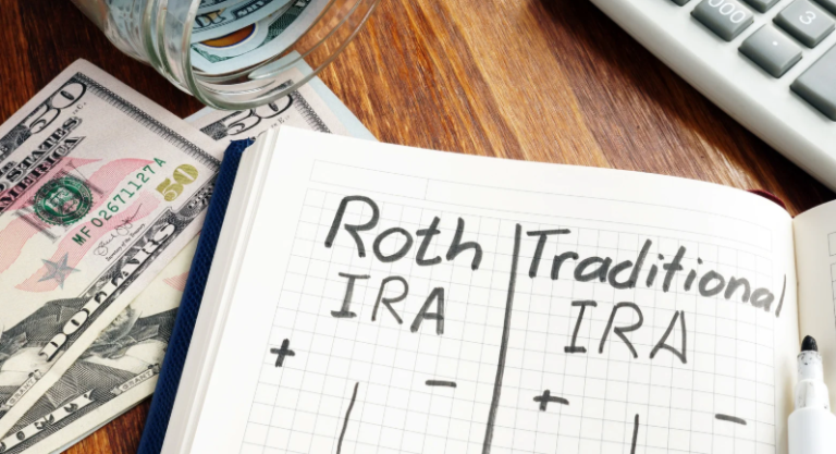 traditional vs roth ira on a notebook