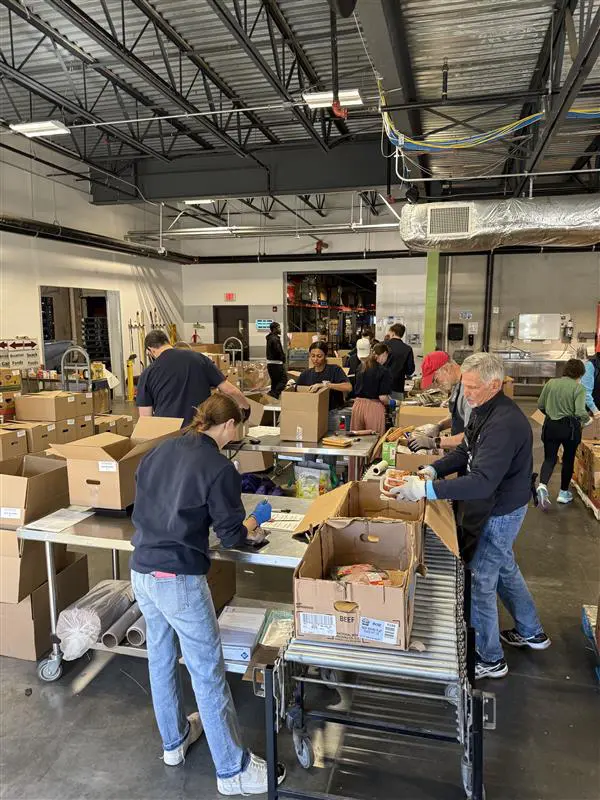 Fuchs Financial team volunteering at the food drive