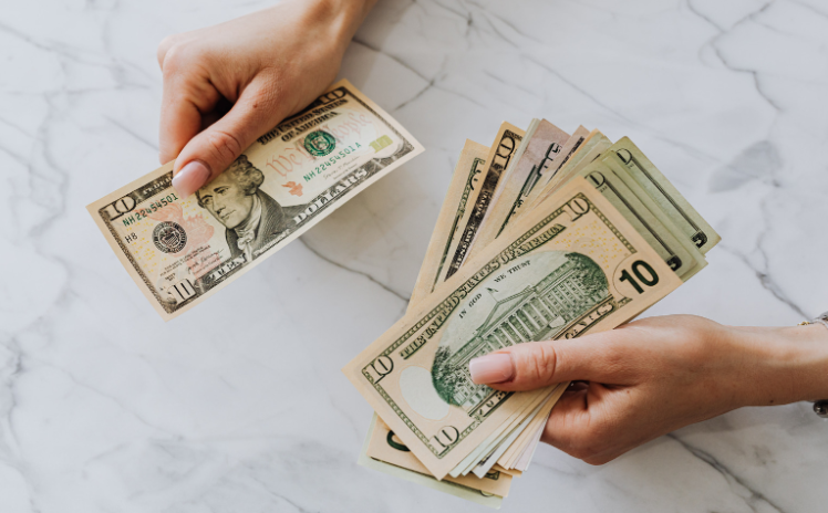 hand holding cash
