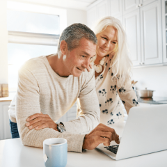 couple reviewing their retirement plan with 500k