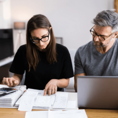 family doing taxes whilst in retirement