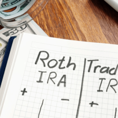 traditional vs roth ira on a notebook